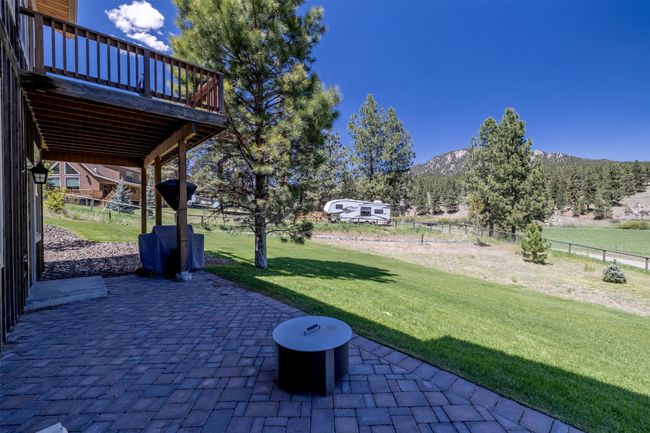 View of patio with a deck with mountain view | Image 54