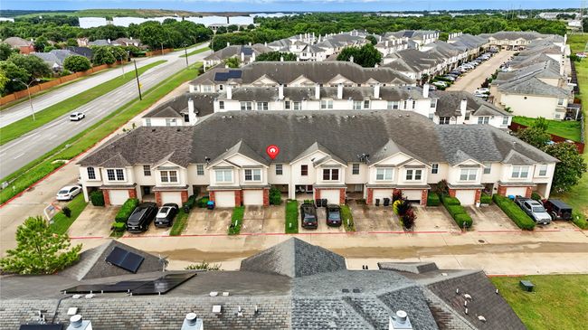Aerial perspective of suburban area featuring property boundaries highlighted | Image 36