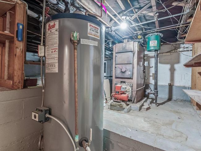 Utility room with water heater | Image 32