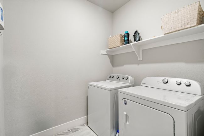 Laundry room featuring separate washer and dryer | Image 20
