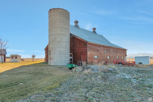 View of side of property with a lawn and an outdoor structure | Image 10