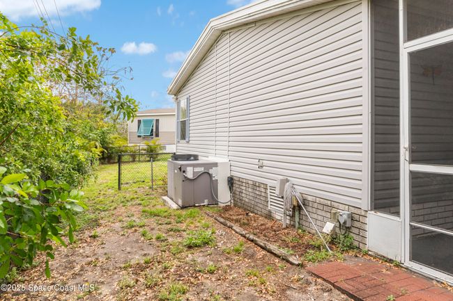 1039 Wren Cir, House other with 3 bedrooms, 2 bathrooms and null parking in Barefoot Bay FL | Image 28