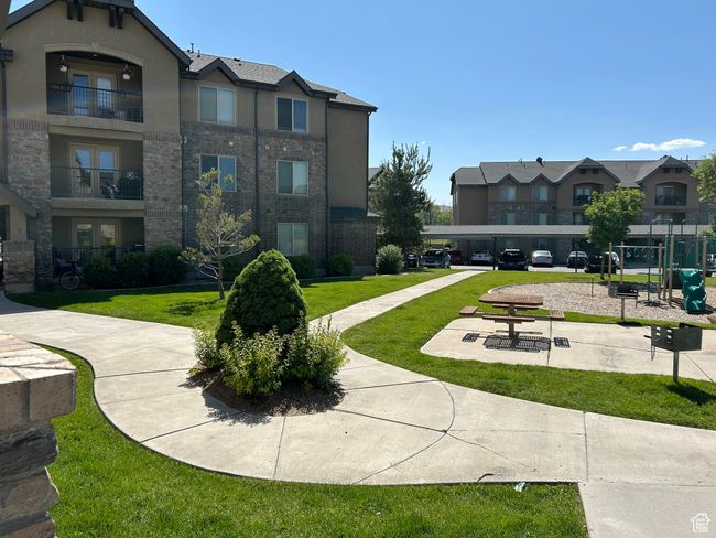 Surrounding community featuring a lawn | Image 9