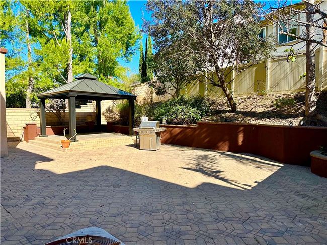 Large backyard with cabana, hardscaped with beautiful pavers | Image 15