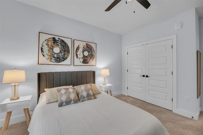 Bedroom with carpet, a closet, and ceiling fan | Image 20