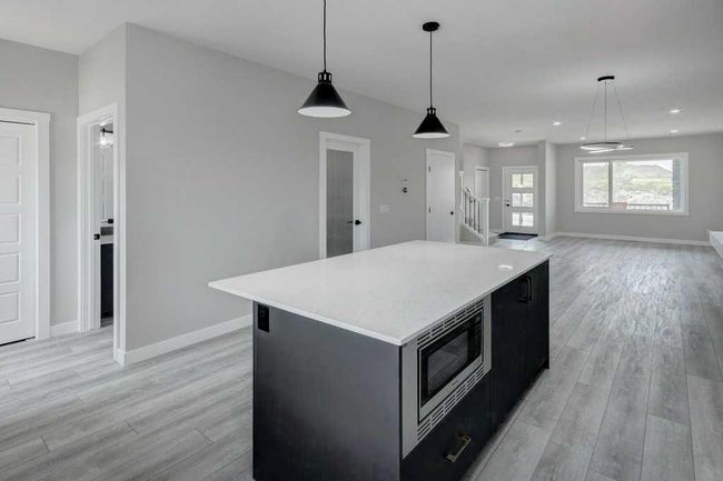 82 Edith Green Nw, Home with 4 bedrooms, 3 bathrooms and 2 parking in Calgary AB | Image 7