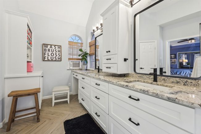 Custom cabinetry offers tons of storage space. | Image 22
