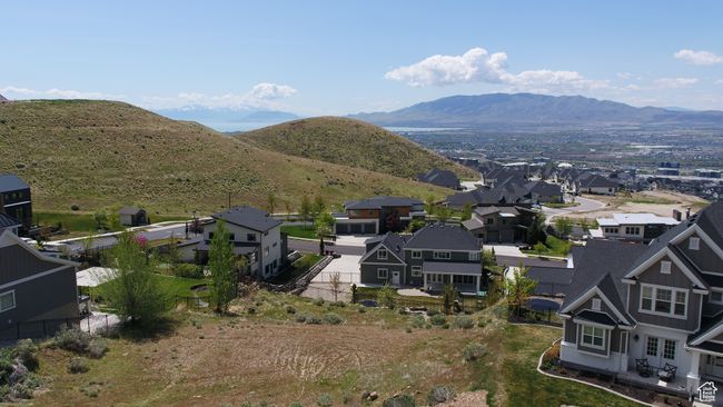 View of mountain backdrop with nearby suburban area | Image 7