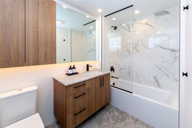 The spa-like bathrooms offer a luxurious retreat. | Image 25