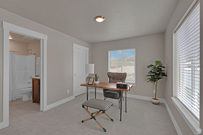 Office area featuring light colored carpet and baseboards | Image 10