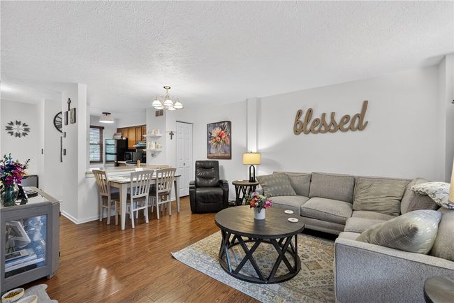 Open living room to dining room and kitchen | Image 5