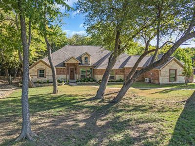 View of front facade featuring a front yard | Image 1