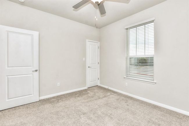 Bathroom featuring vanity, wood finished floors, and bathing tub / shower combination | Image 20