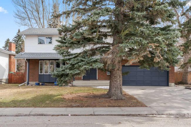 2419 Usher Road Nw, Home with 4 bedrooms, 2 bathrooms and 4 parking in Calgary AB | Image 1