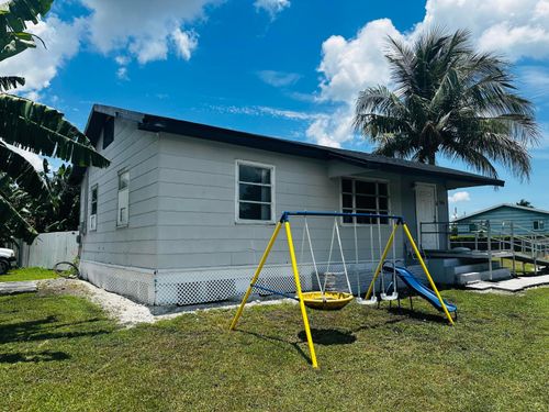 566 Se 7th Dr, Belle Glade, FL, 33430-4109 | Card Image