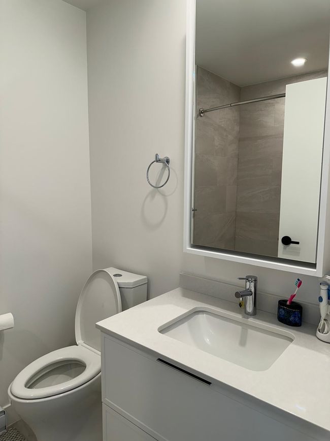 Bathroom featuring vanity and toilet | Image 18
