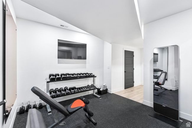 Workout area featuring baseboards and visible vents | Image 33