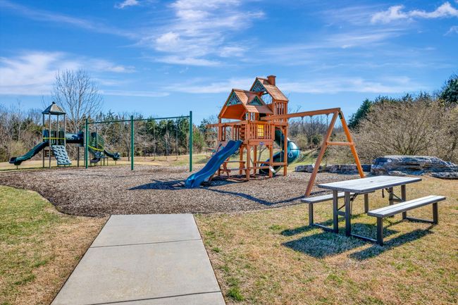 Community playground is right next to the pool. | Image 43