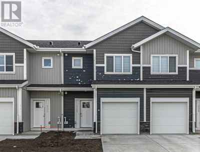 137 Red Embers Link Ne, Townhouse with 4 bedrooms, 4 bathrooms and 2 parking in Calgary AB | Image 1