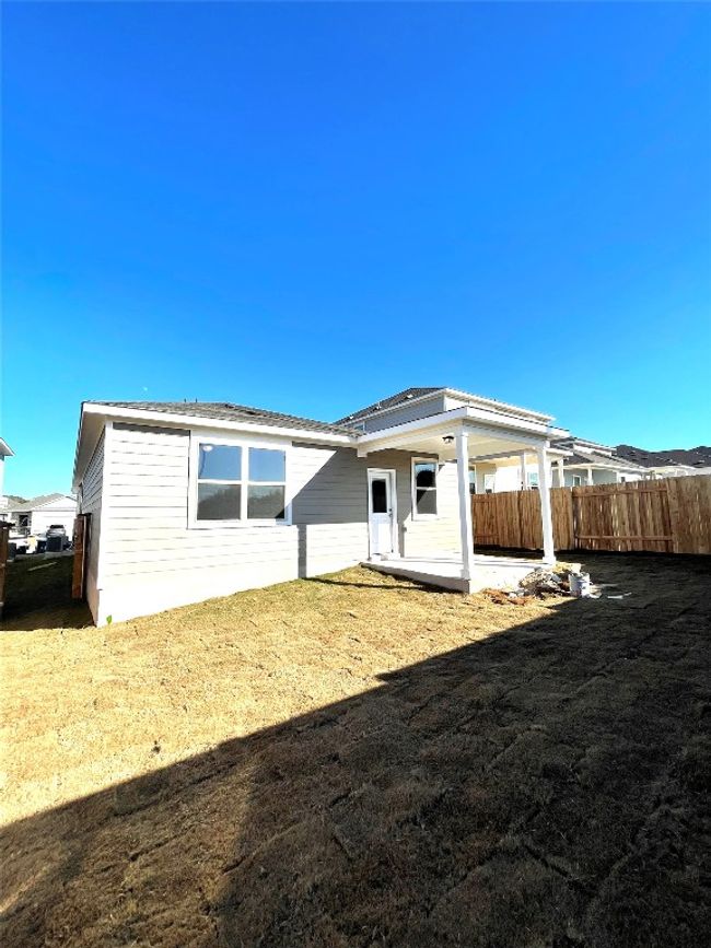 Rear view of property featuring a patio area | Image 21