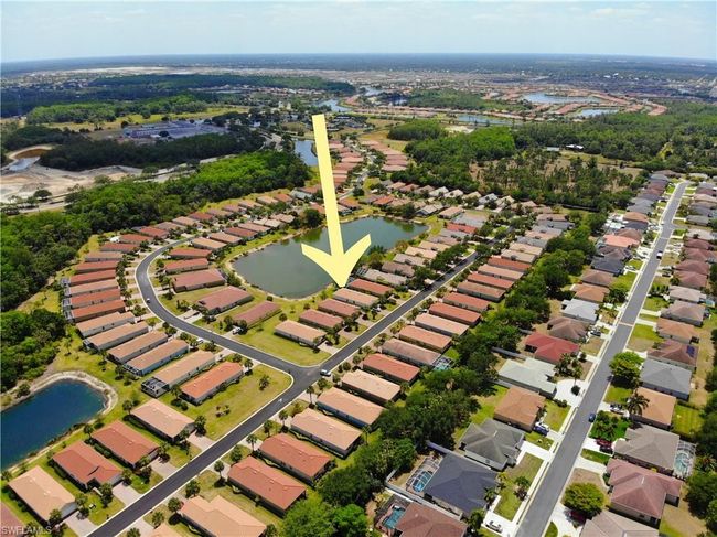 Birds eye view of property with a water view and a residential view | Image 43