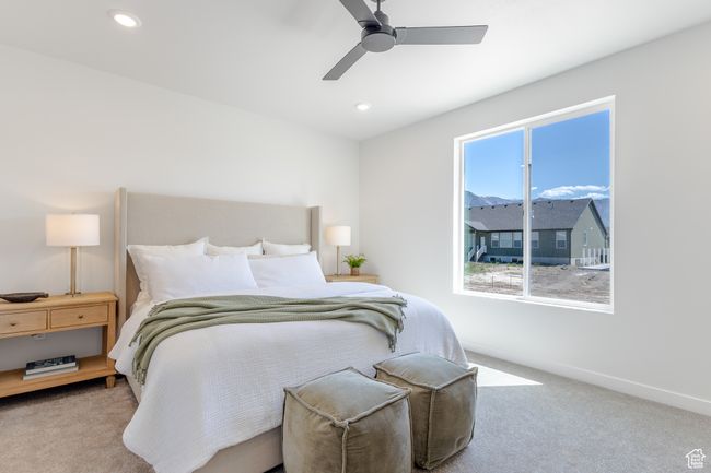 Bedroom with carpet flooring, baseboards, ceiling fan, and recessed lighting | Image 12
