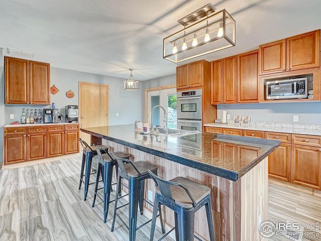15500 Hadfield St, House other with 5 bedrooms, 3 bathrooms and 2 parking in Sterling CO | Image 9
