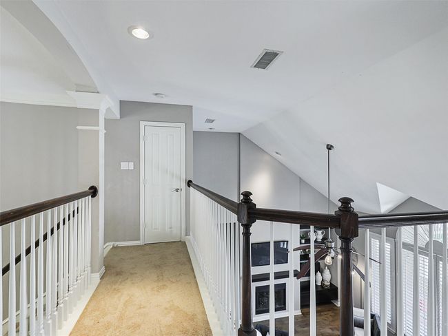 Corridor with lofted ceiling, an upstairs landing, recessed lighting, and carpet | Image 32