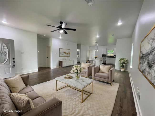 Living area with a ceiling fan, dark wood-style flooring, baseboards, and recessed lighting | Image 8