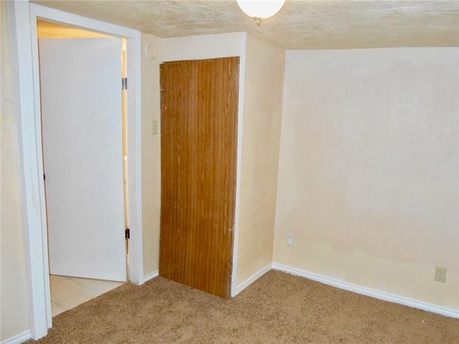 Spare room with carpet and baseboards | Image 9