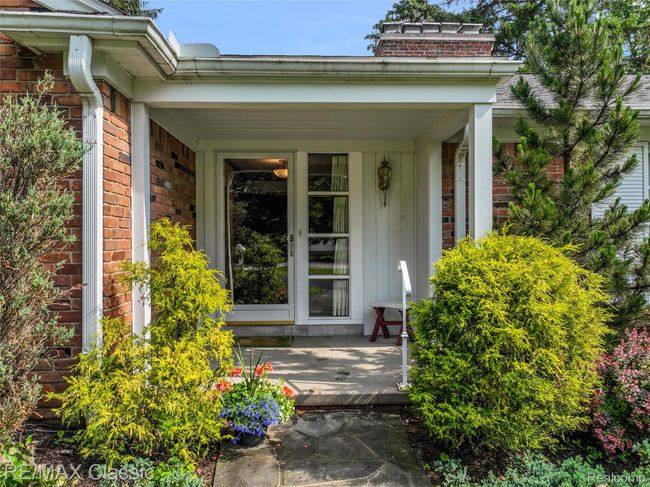 Welcoming entrance with covered porch | Image 6