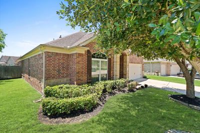 This beautiful, stately, single level four-sided brick home is a treasure hard to find. | Image 3