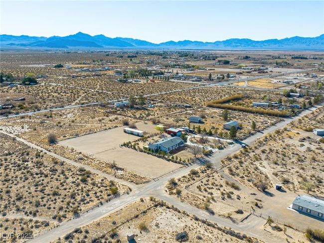 Drone / aerial view featuring a mountain view, a desert view, and a rural view | Image 78