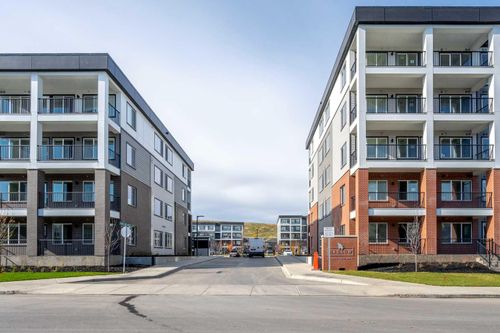 1406-111 Wolf Creek Dr Se, Calgary, AB, T2X5X2 | Card Image
