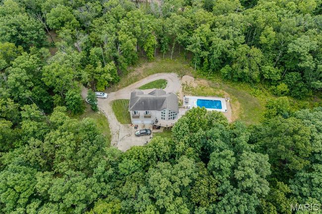 Aerial overview of property's location with a forest | Image 67