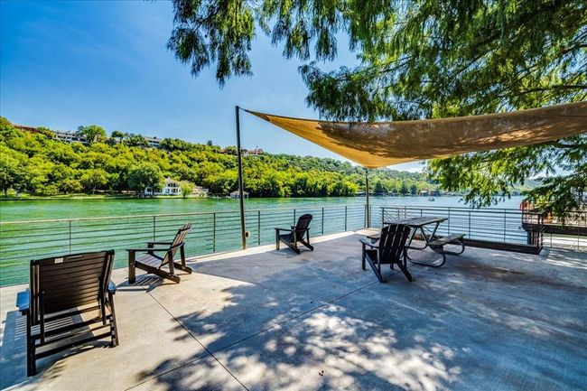 View of home's community with a water view and a forest view | Image 6