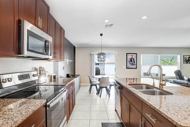 13625 Wild Ginger St, House other with 4 bedrooms, 2 bathrooms and null parking in RIVERVIEW FL | Image 14