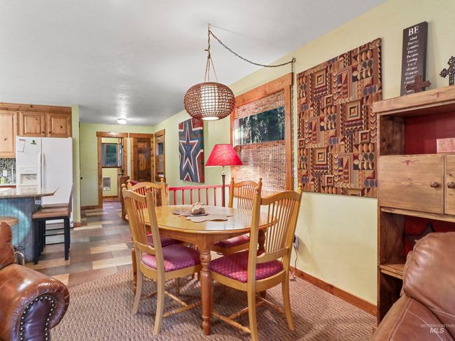 Dining room featuring baseboards | Image 49