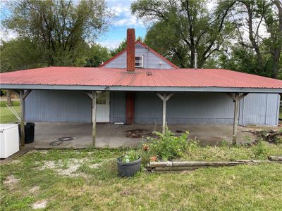 Rear view of property featuring a lawn | Image 3