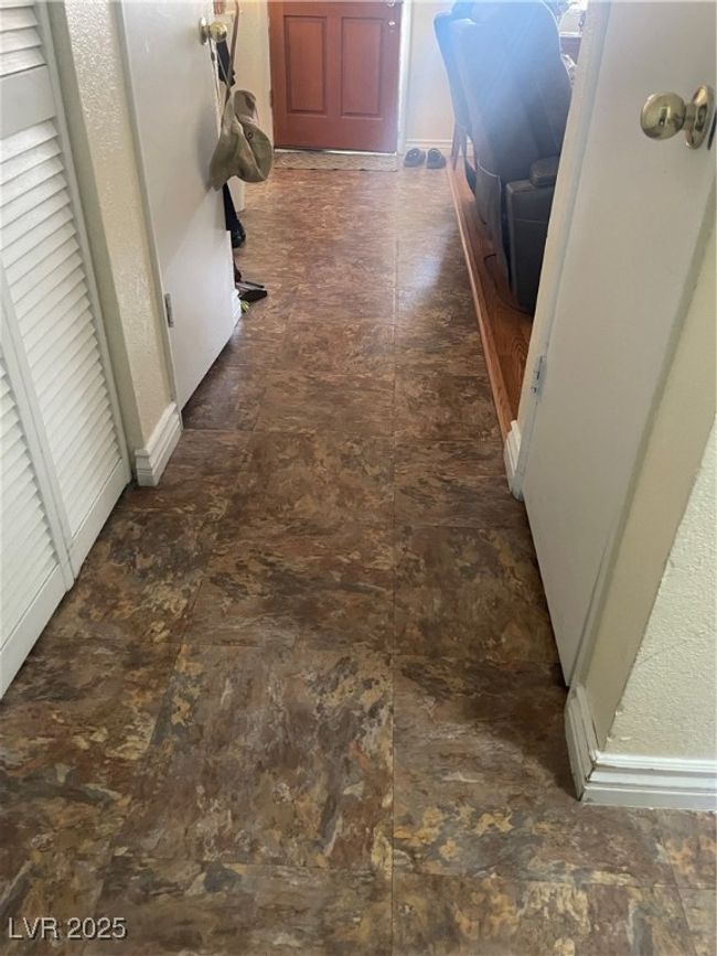 Hall featuring baseboards | Image 9