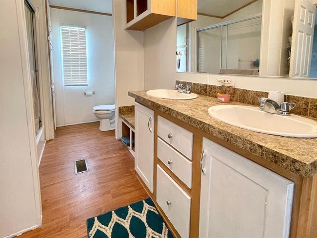 Dual vanity and separate shower in primary bath | Image 18