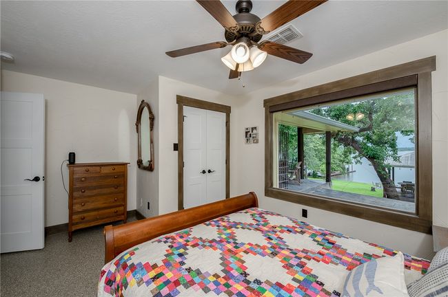 Bedroom with ceiling fan | Image 28
