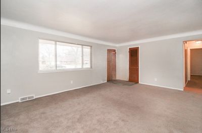 View of carpeted empty room | Image 3