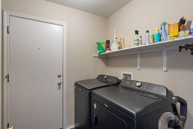 Washroom with extra storage space | Image 25