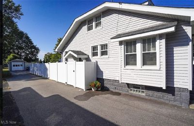 View of property exterior featuring a garage | Image 3