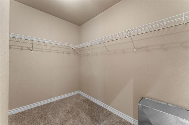 Walk in closet with carpet | Image 47