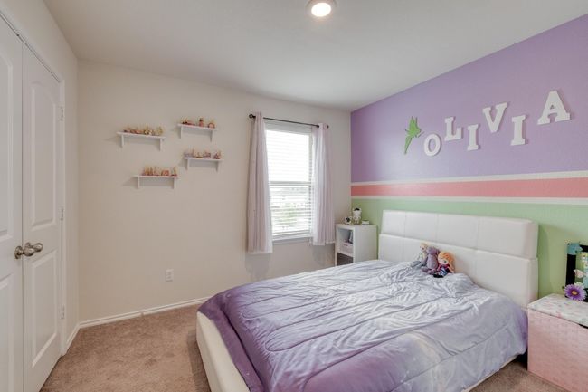 Carpeted bedroom featuring baseboards | Image 27