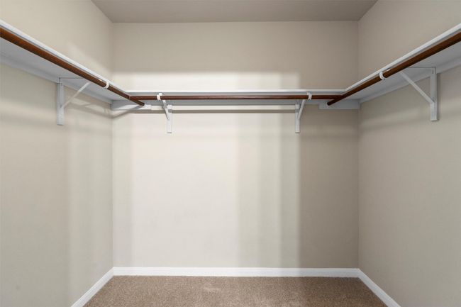 To complete the owner's suite is a large walk-in closet. | Image 17