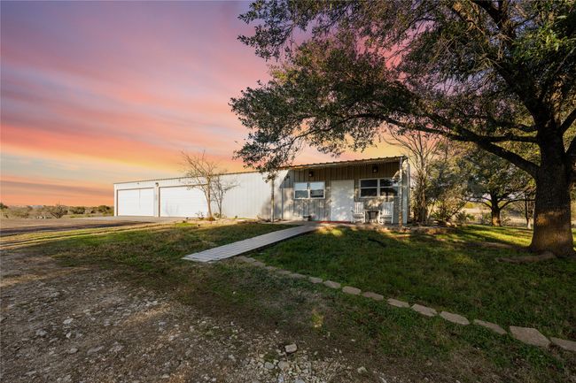 Front of garage/shop and apartment | Image 18