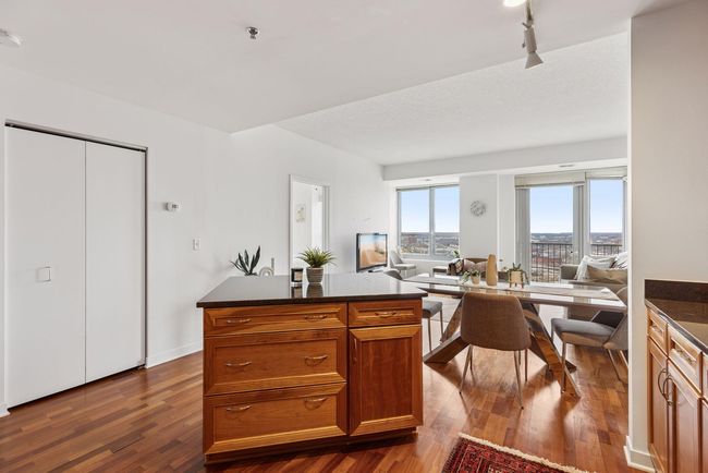 Kitchen island provides extra storage | Image 10